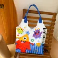 Cute cartoon monster canvas tote bag, large capacity shoulder bag for women and students. - Colorful Monster