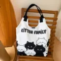 Casual canvas tote bag with cute cat prints, large capacity shoulder bag for daily commuting. - Cat Meeting