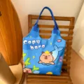 Blue capybara print canvas tote bag, cute cartoon mermaid design casual shoulder bag for women. - Cute Capybara Undersea