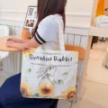 Süße Cartoon-Canvas-Tragetasche, große Kapazität Umhängetasche, lässige Studententasche. - Sonnenblumenhase / Kein Reißverschluss Keine Innentasche