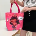 Pink canvas tote bag with cute cartoon girl print, stylish casual handbag for commute. - Wheat Girl