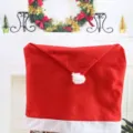 Funda de silla festiva de tela no tejida roja estilo gorro de Papá Noel decorada - Funda de silla de gorro de Navidad de tela no tejida / 1 Pieza