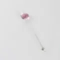 Transparante glazen roerlepel met schattige roze fruittop voor koffie, dessert en melk. - Lepel met roze kop