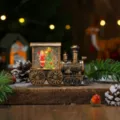 Weihnachtsschneekugel Zug Nachtlicht, gold gebürstete PVC Feiertag Deko Ornament. - Weihnachtsmann und Kind Stil