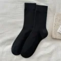 Women's solid color ribbed crew socks for autumn and winter comfortable daily wear. - One Size. / Black