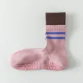 Pink non-slip yoga socks with brown ribbed cuffs and grip soles for pilates and fitness workouts. - One Size / Pink