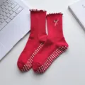Red yoga socks for women with non-slip silicone dots, cute bow embroidery, and ruffled cuffs. - One Size / Red