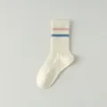 Classic cotton mid-tube socks with pink and blue stripes, comfortable daily athletic wear. - One Size / White