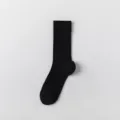 Chaussettes montantes en coton côtelé noir uni classique pour femmes, confort quotidien. - Taille unique / Noir