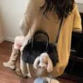 Fashionable black faux fur Boston crossbody bag with a plush bunny accessory - Style With Pendant / Black With Pendant
