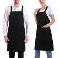 Tablier de travail noir réglable doté de poches profondes et d'un tissu très résistant. - Noir