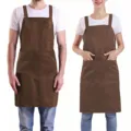Brown adjustable polyester work apron with multi pockets for restaurant chef and kitchen service. - Coffee