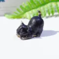 Black crystal epoxy resin stretching cat figurine, cute desktop ornament for home decor. - Obsidian