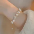 Elegant pearl beaded bracelet with delicate gold beads, wave design women jewelry variant. - Wave Pearl Beaded Style (MY36329)