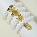 Set di braccialetti di perle eleganti con ciondoli conchiglia e stella marina oro - Stile Bracciale di Perle Pendente Oceano Oro (31286-ank-white-EP)