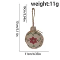 Handmade burlap Christmas ball ornament featuring red flower design and hanging twine loop - Christmas Ball
