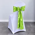 Elegant lime green satin chair sash bow tied on a white chair for banquet events - Fruit Green