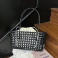 Black PVC woven tote bag for women, stylish summer beach handbag with drawstring pouch. - Black