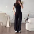 Black knit short sleeve t-shirt and wide leg pants set, casual two piece outfit variant. - Black