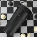 Black stainless steel coffee tumbler with handle detail, portable travel mug for hot drinks. - 400ml / Black