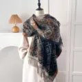 Detailed view of the ethnic pattern and tassel hem on a soft cashmere-feel winter shawl - Cross Pattern - Black / 200*65cm