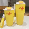 Portable yellow travel coffee mug with lid and strap stainless steel insulated tumbler cup - Yellow