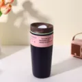 Stainless steel insulated travel coffee mug with leak-proof lid and paper belly band. - 350ml / Black