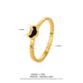 Bague en acier inoxydable dorée avec motif ondulé et breloque cadenas Ruyi noir - Taille 6 / Or