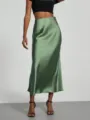 Elegant high-waist satin midi skirt for women, featuring a smooth drape and chic silhouette. - S / Light Green