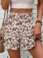 Floral print ruffle high waist skirt shorts detail showing soft drape and lightweight fabric. - Apricot Print