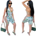 Women sexy halter lace up money print cut out romper jumpsuit detailed front back view. - S / Green