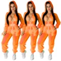 Sexy oranger transparenter Mesh Kapuzen Jumpsuit für Damen, langärmlige Clubwear Mode. - Orange