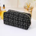 Schwarze und goldene Tweed Kosmetiktasche, elegante Karo Make-up Tasche mit goldenem Reißverschluss. - Schwarz