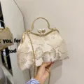 Exquisite beige embroidered floral handbag featuring pearl clasp and gold chain strap - Gold