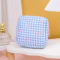 Trousse de toilette à carreaux bleus et nœud rose, pochette matelassée pour maquillage et rangement. - Nœud Bleu