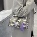 Borsa a mano etnica in tessuto stile cinese con nappa viola e motivi a onde classici - Viola