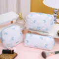 Grand ensemble de trousses de maquillage matelassées, organisateur nœud bleu portable. - Trousse de maquillage 18*12*10 / Fond Blanc Nœud Bleu