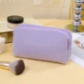 Borsa per trucco in peluche viola, morbida pochette cosmetica soffice, astuccio con cerniera - Viola
