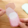 Portable pink travel disposable soap sheets in a compact case for outdoor washing. - Pink