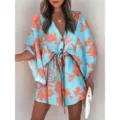 Close-up detail of the women's light blue floral print V-neck beach dress with adjustable drawstring waist. - S / Flower Style 4