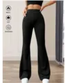 Nahaufnahme Detail von schwarzen hochelastischen Schlag-Yogahosen für Damen Komfort - M / Schwarz