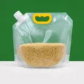 Transparent stand-up spout pouch with handle for grain storage, sealing liquid packaging bag. - 1.5kg Capacity