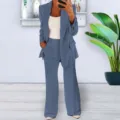 Detail view of women's stylish solid color casual blazer and wide-leg trousers suit set. - S / Set / Blue