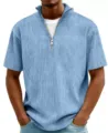 Detail view of men's light blue half-zip ribbed knit short sleeve polo t-shirt with texture. - Sky Blue