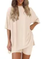 Detail shot of ribbed short sleeve top and matching shorts lounge set in solid beige color. - XS / Top And Bottom / Apricot
