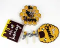 Set of three wooden bee-themed home decorations with honeycomb and beehive designs - Bee Theme Set