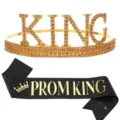 Close-up of Prom King party set featuring a gold rhinestone crown and black sash - Yellow Rhinestone Crown + Black Gold Letter Sash
