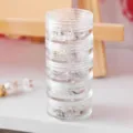Boîte à bijoux transparente 5 niveaux, mini organiseur portable pour boucles d'oreilles et bagues. - L