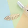 Elegante gouden haarklem in bladvorm met een schitterend strass-detail voor bruiden - FJ005 gouden strass-stijl