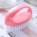 Brosse à linge ovale rose, poils blancs doux, outil de plastique pour le nettoyage. - Rose